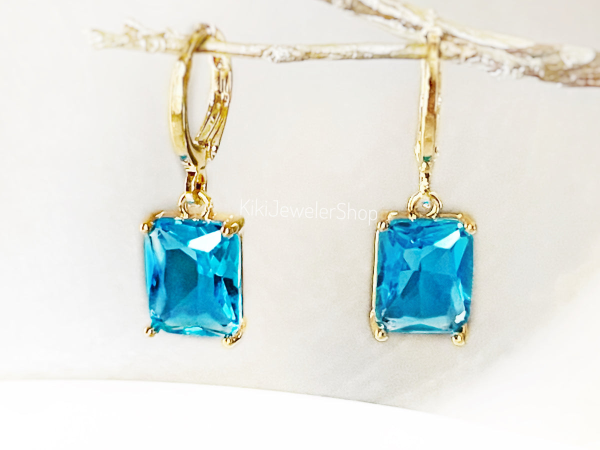 Ensemble de 2 bijoux en topaze bleue taille émeraude