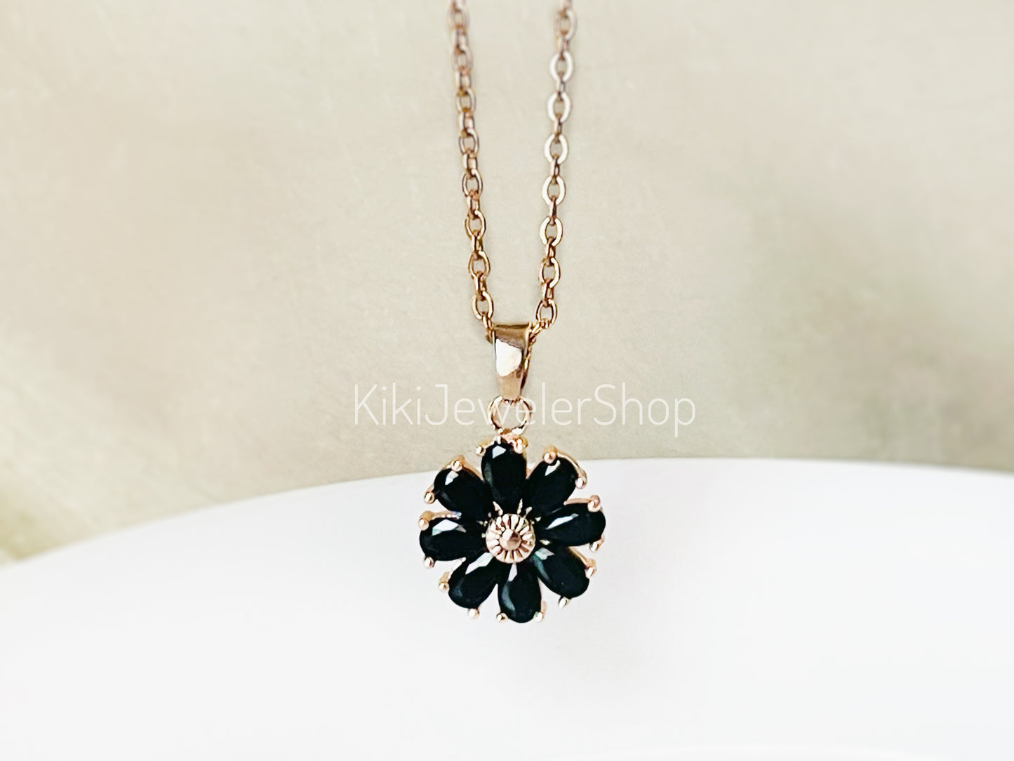 Garnet daisy flower charm necklace
