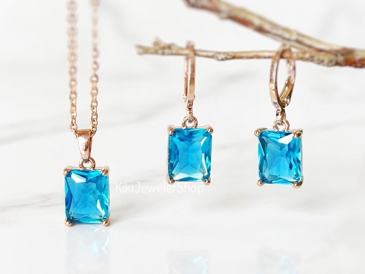 Ensemble de 2 bijoux en topaze bleue taille émeraude
