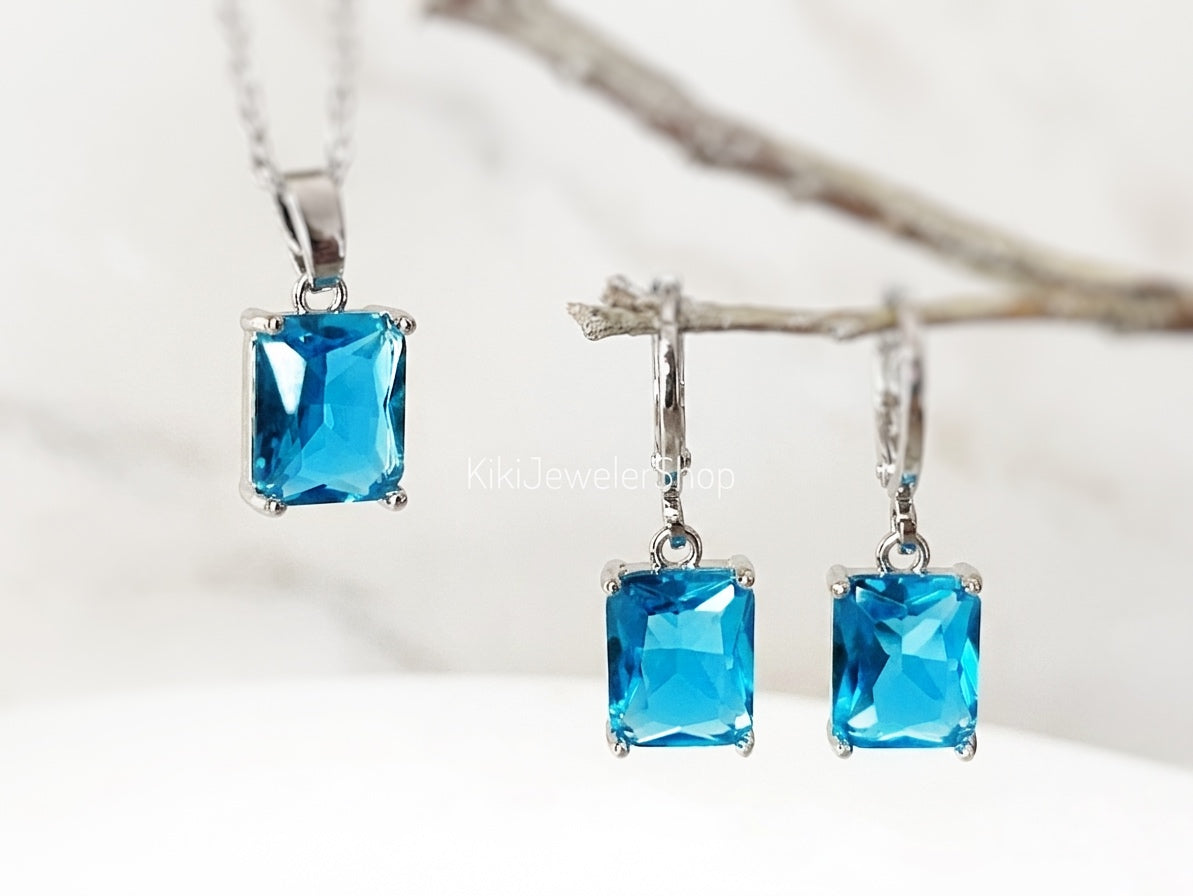 Ensemble de 2 bijoux en topaze bleue taille émeraude