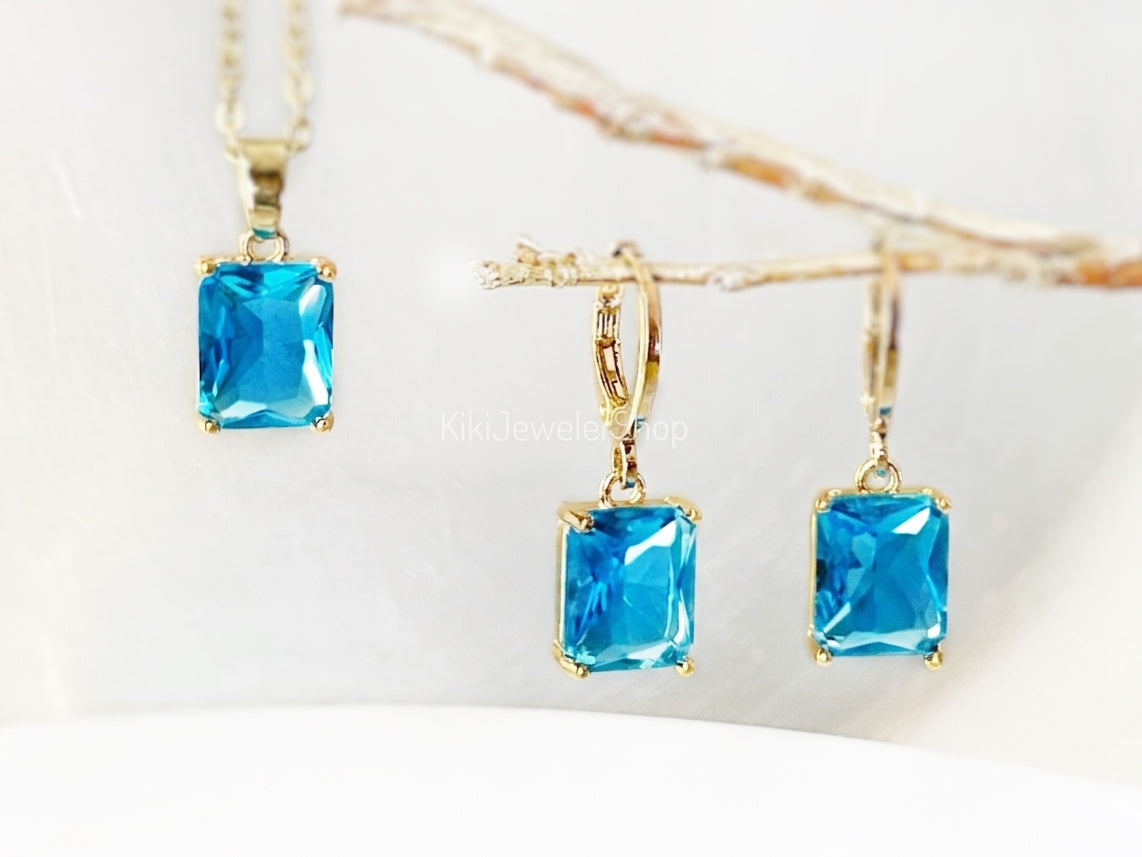 Ensemble de 2 bijoux en topaze bleue taille émeraude